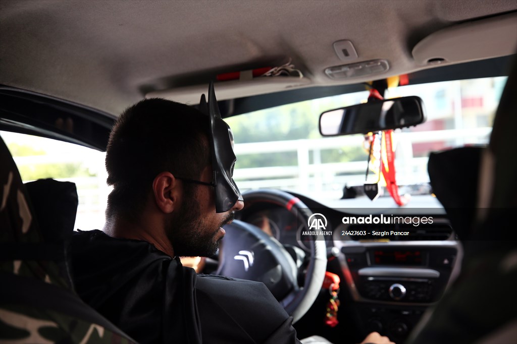 "Batman" costumed taxi driver in Turkey's Mersin