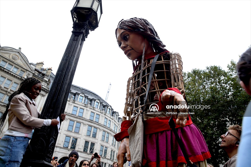 Little Amal, symbol of child refugees, reaches London