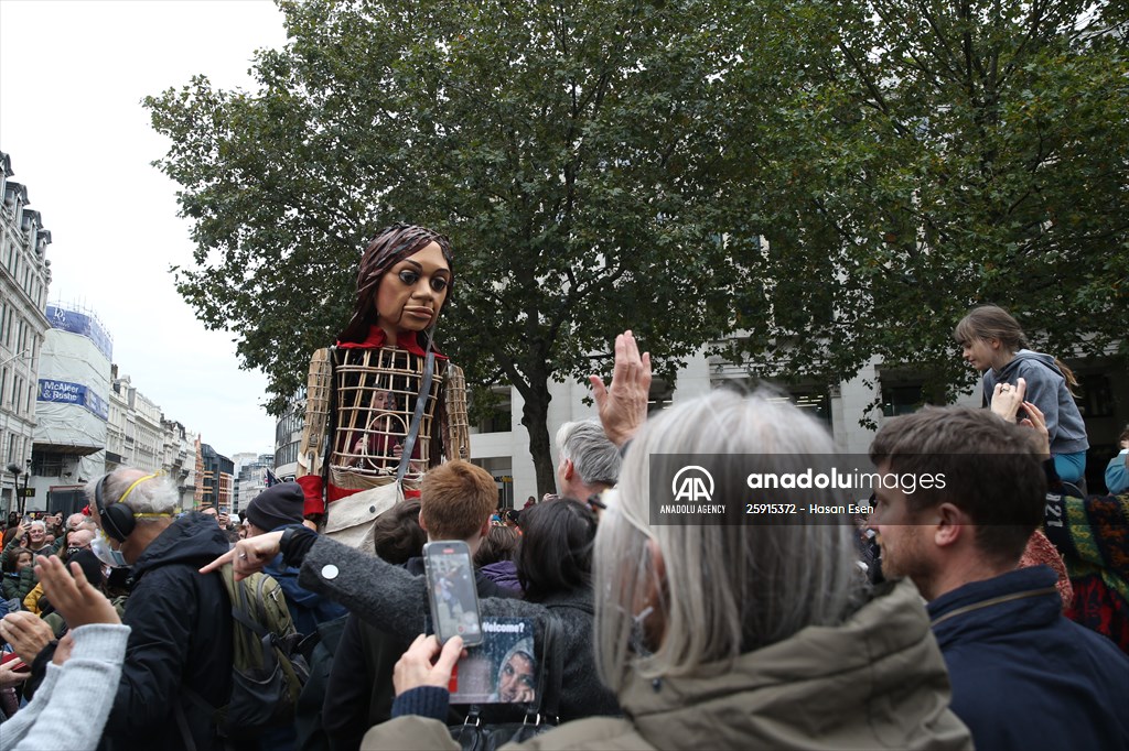 Little Amal, symbol of child refugees, reaches London