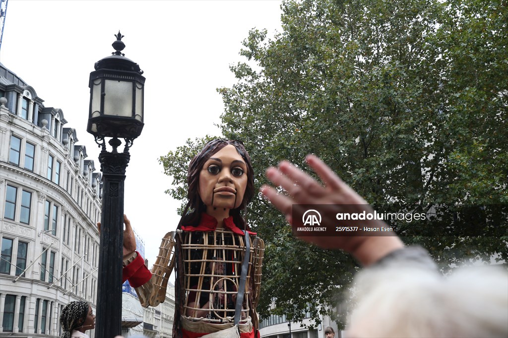 Little Amal, symbol of child refugees, reaches London