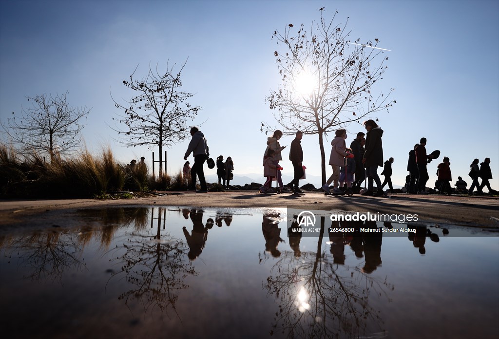 People enjoy sunny winter day in Izmir