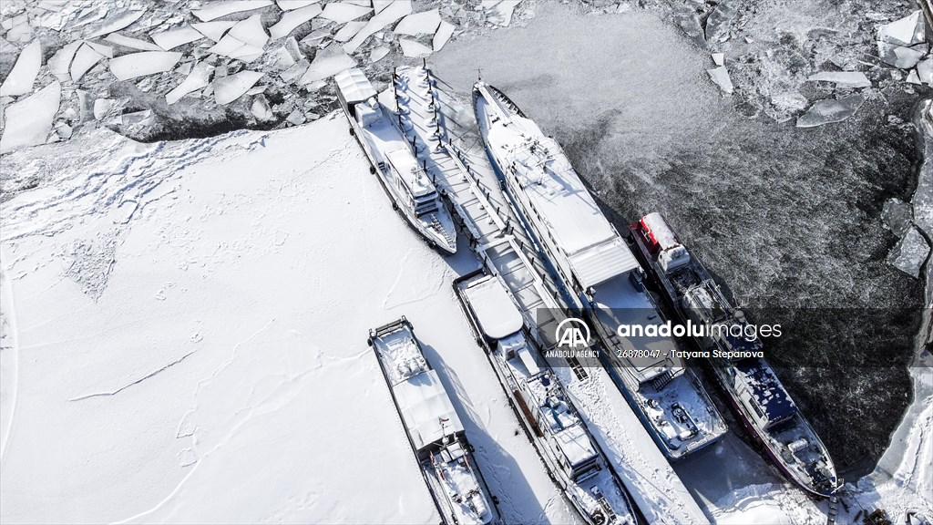 Boats and ships stranded on the frozen Lake Baikal