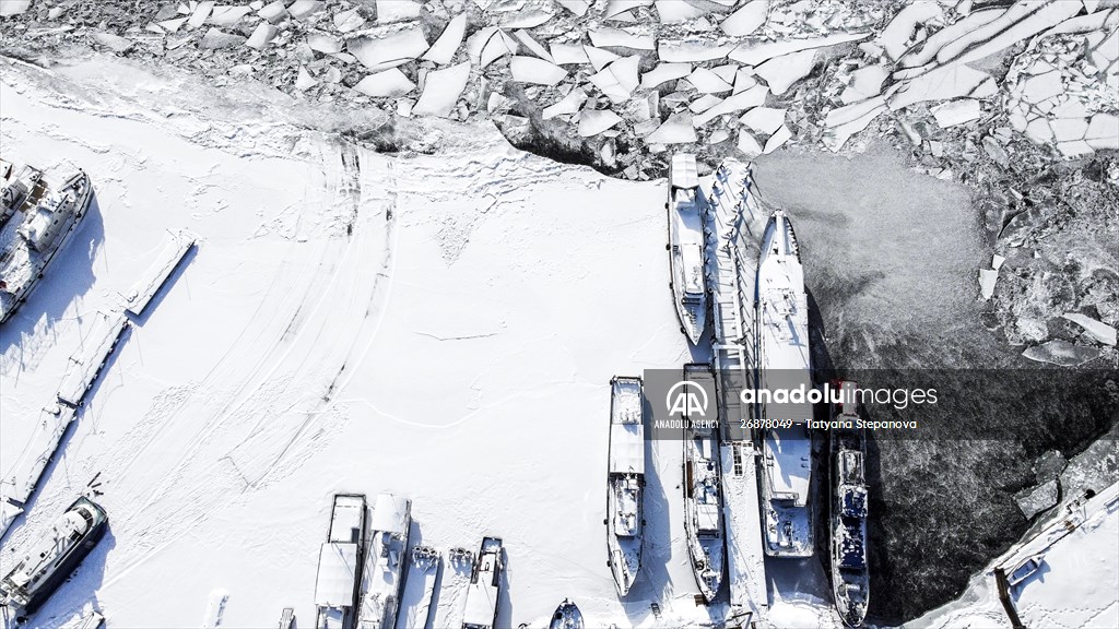 Boats and ships stranded on the frozen Lake Baikal