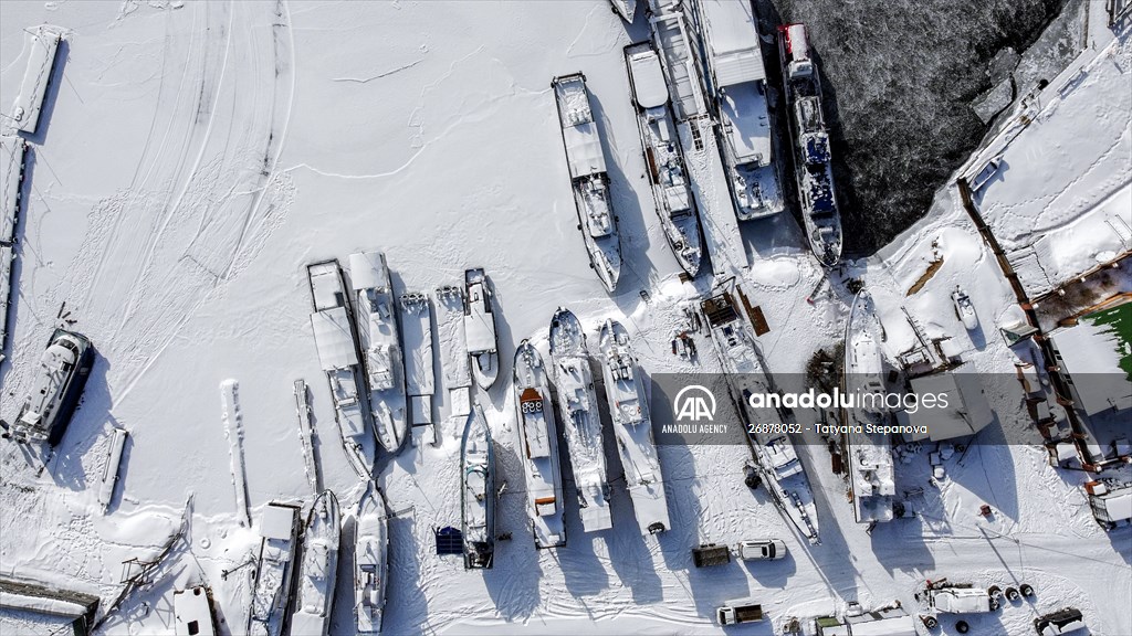 Boats and ships stranded on the frozen Lake Baikal
