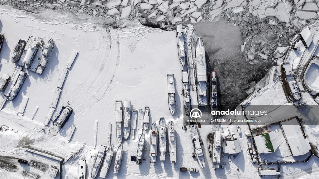 Boats and ships stranded on the frozen Lake Baikal