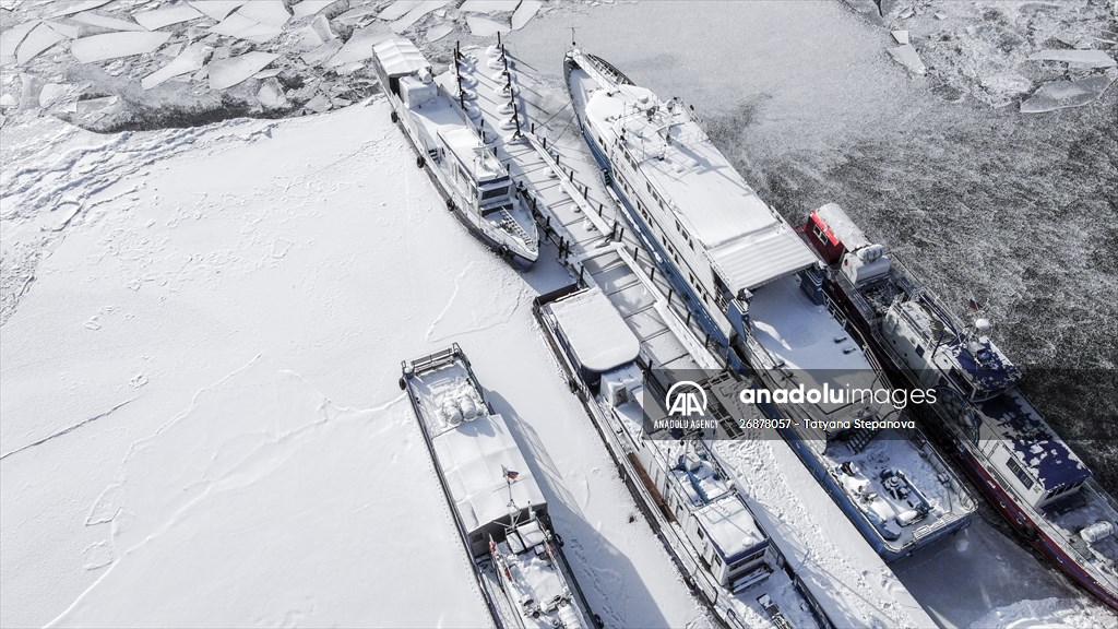Boats and ships stranded on the frozen Lake Baikal