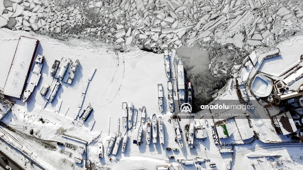 Boats and ships stranded on the frozen Lake Baikal