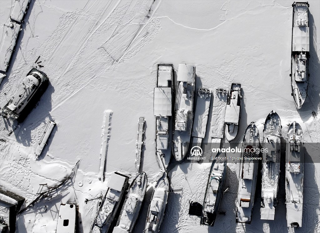 Boats and ships stranded on the frozen Lake Baikal