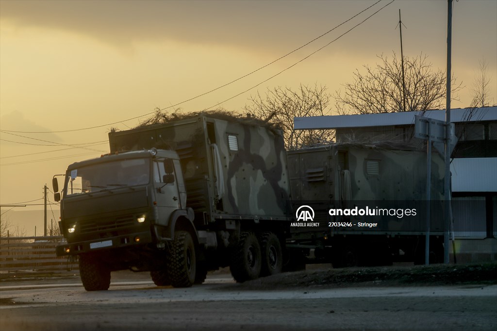 A convoy of Russian military vehicles moving towards border in Donbas region
