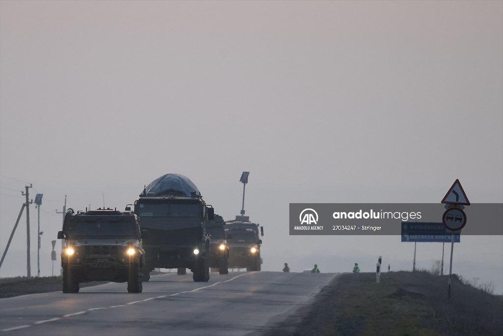 A convoy of Russian military vehicles moving towards border in Donbas region