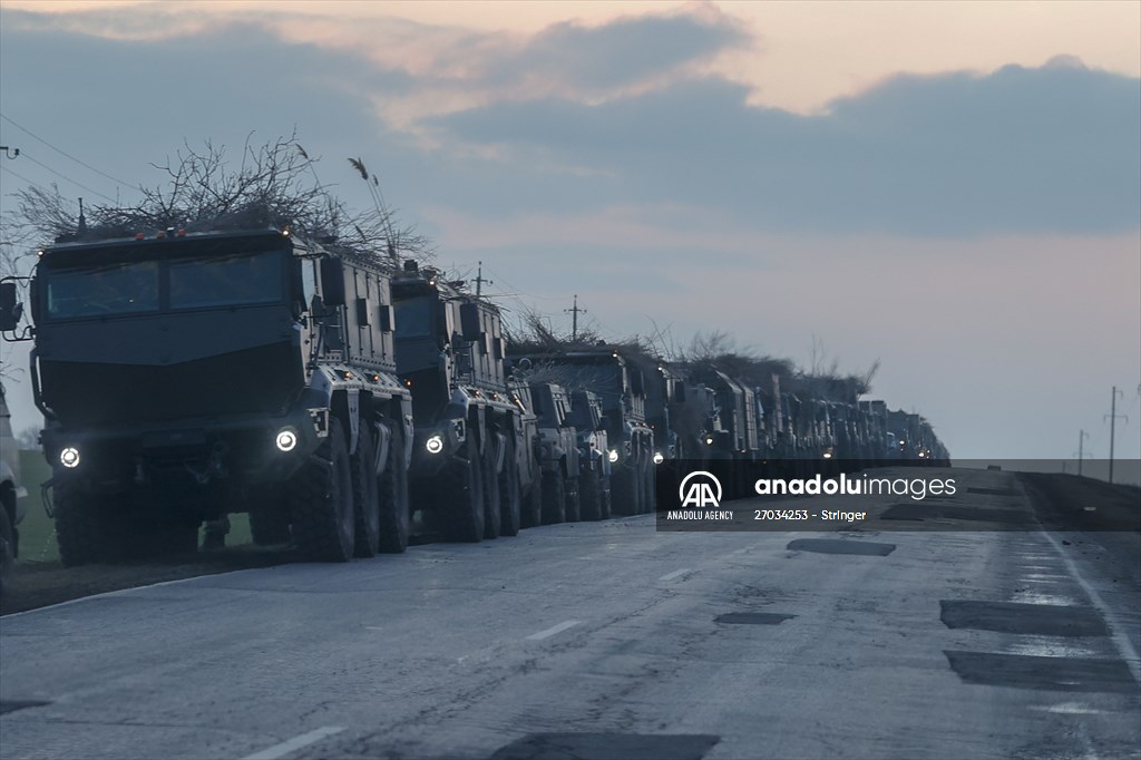 A convoy of Russian military vehicles moving towards border in Donbas region
