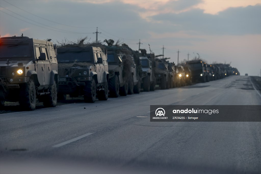 A convoy of Russian military vehicles moving towards border in Donbas region