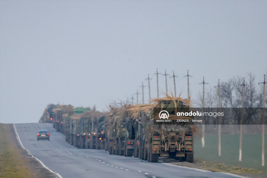 A convoy of Russian military vehicles moving towards border in Donbas region