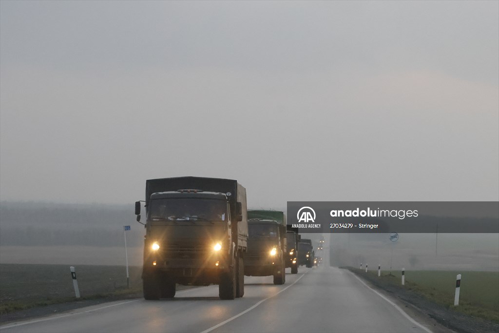 A convoy of Russian military vehicles moving towards border in Donbas region