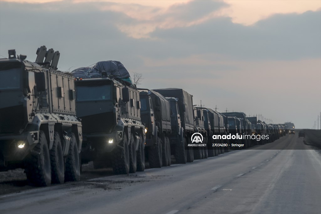 A convoy of Russian military vehicles moving towards border in Donbas region