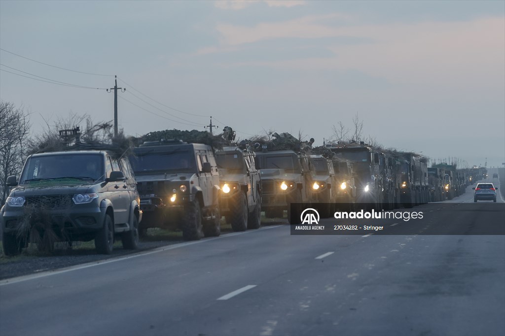 A convoy of Russian military vehicles moving towards border in Donbas region