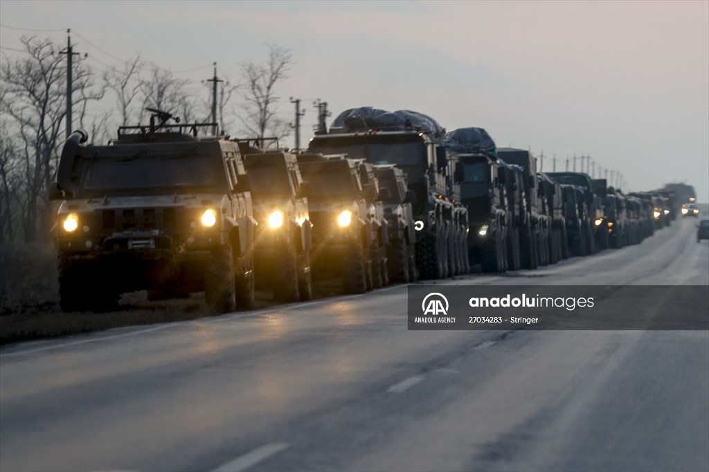 A convoy of Russian military vehicles moving towards border in Donbas region
