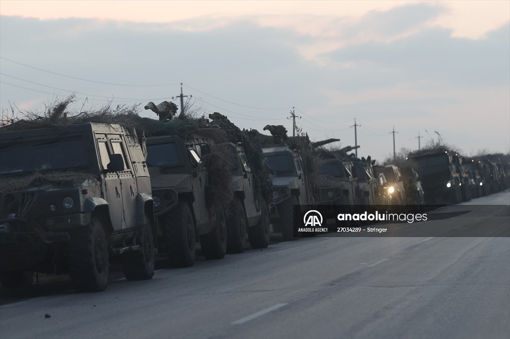 A convoy of Russian military vehicles moving towards border in Donbas region