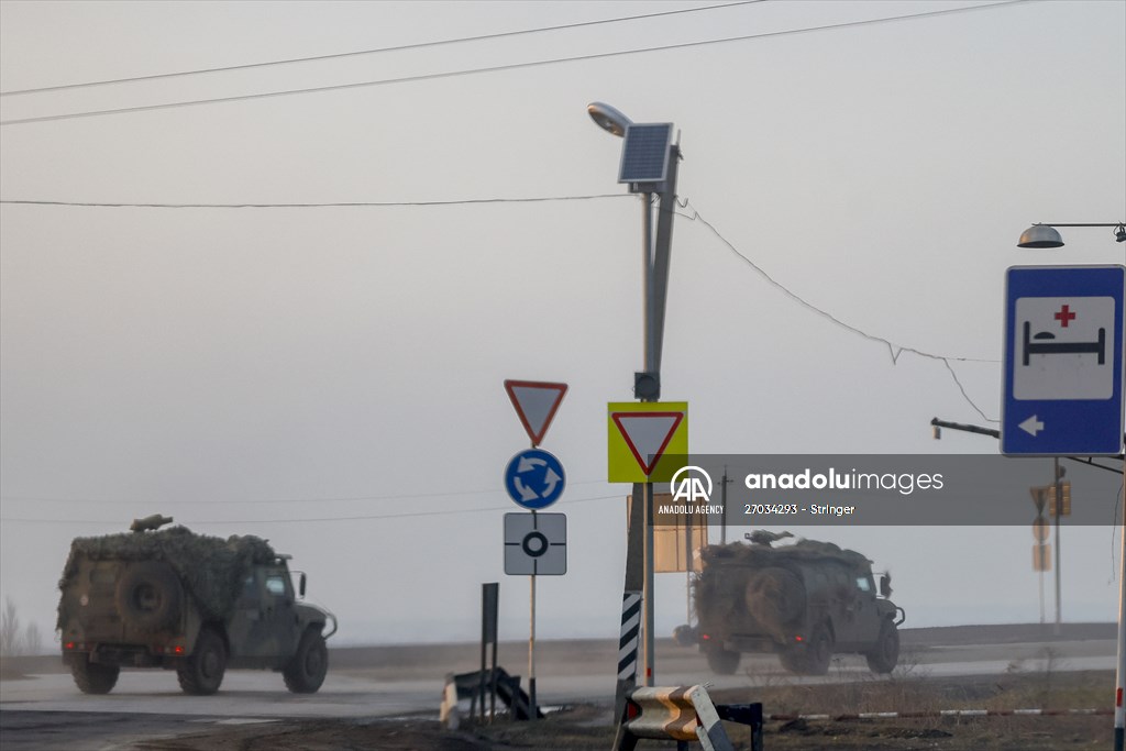 A convoy of Russian military vehicles moving towards border in Donbas region