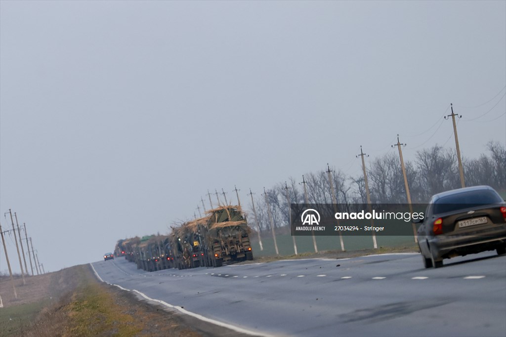 A convoy of Russian military vehicles moving towards border in Donbas region