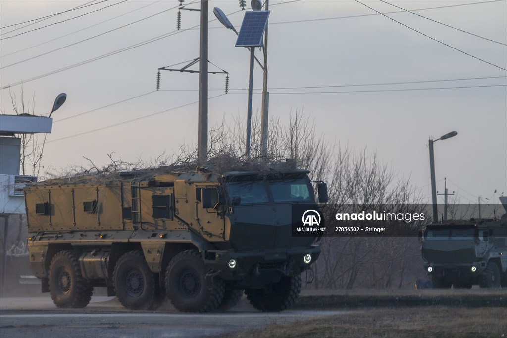 A convoy of Russian military vehicles moving towards border in Donbas region