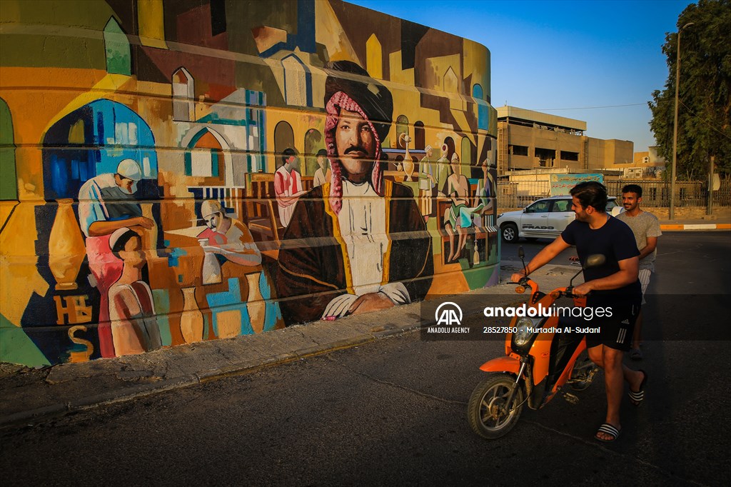 The walls of Baghdad are colored by murals of Iraqi artists