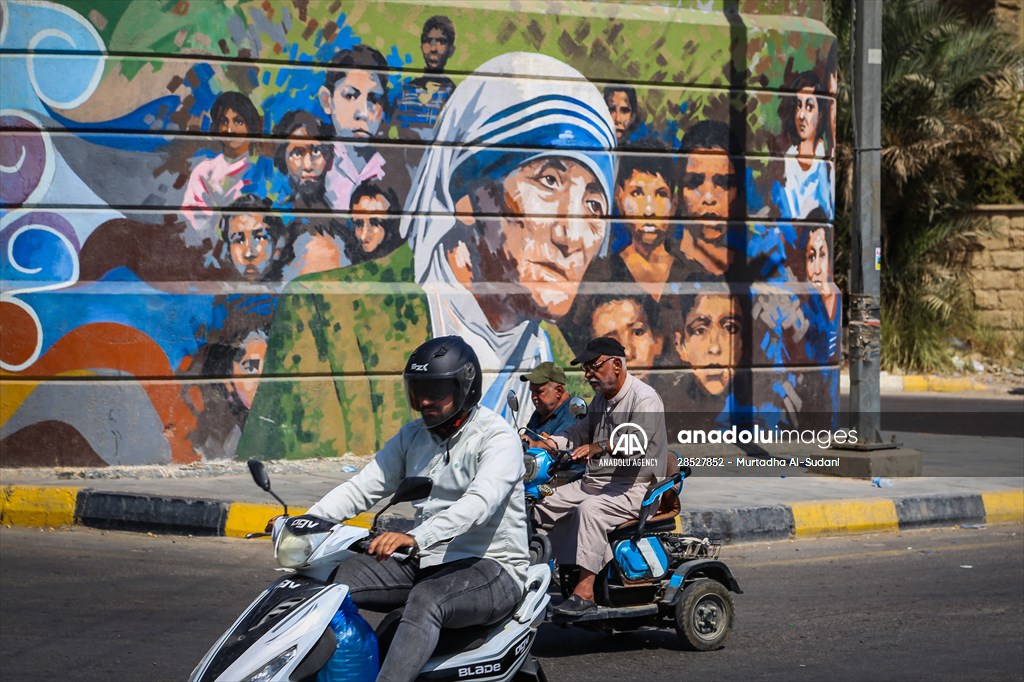 The walls of Baghdad are colored by murals of Iraqi artists