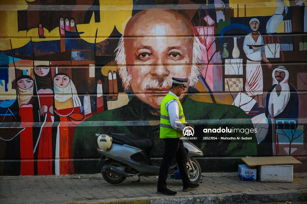The walls of Baghdad are colored by murals of Iraqi artists