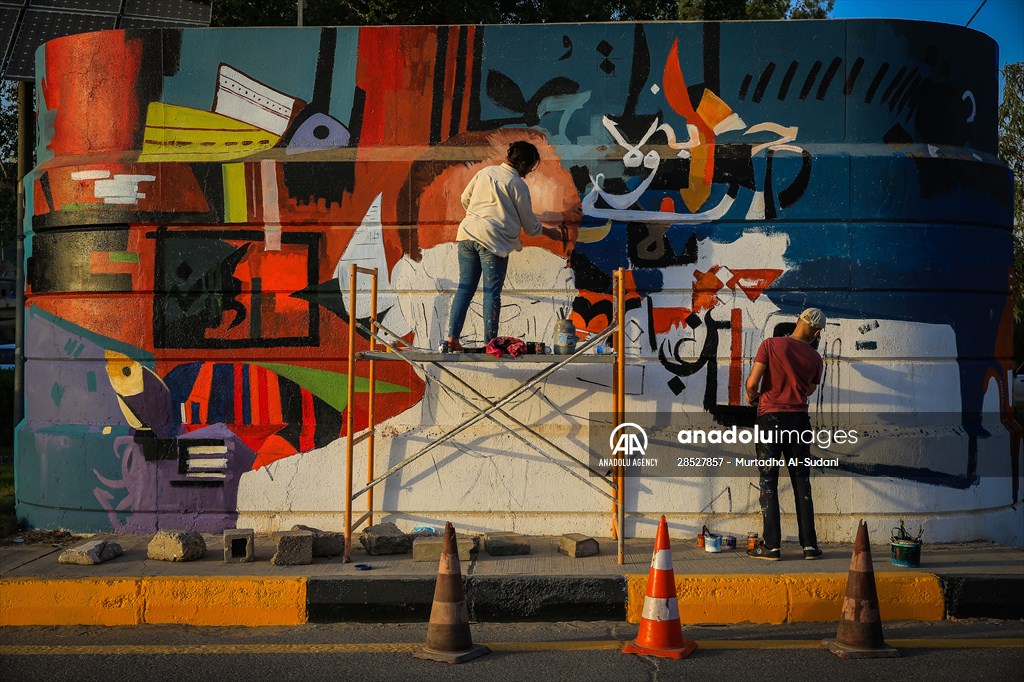 The walls of Baghdad are colored by murals of Iraqi artists