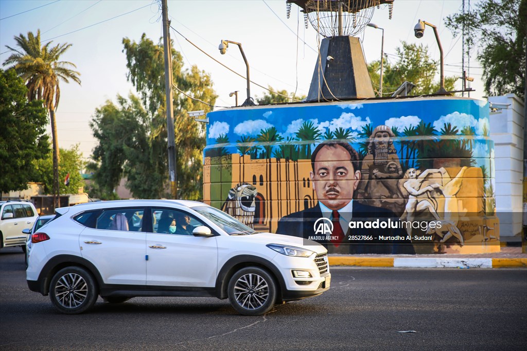 The walls of Baghdad are colored by murals of Iraqi artists
