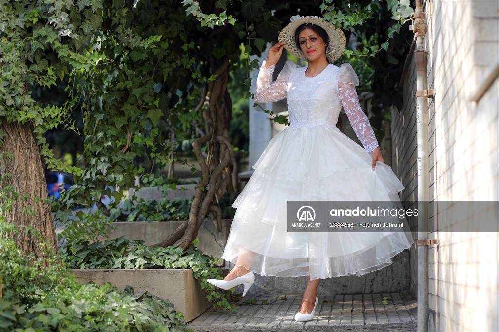 Acid attack victims model for Iranian fashion designer