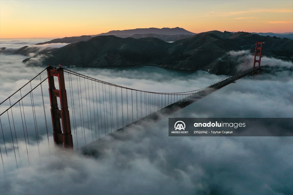Golden Gate Bridge covered with mesmerizing fog