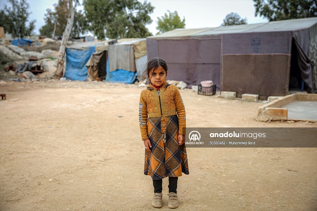 Syrian children after 12th anniversary of the Syrian Civil War at the tent city in Idlib