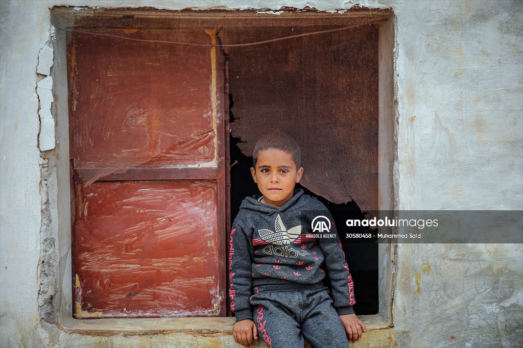 Syrian children after 12th anniversary of the Syrian Civil War at the tent city in Idlib