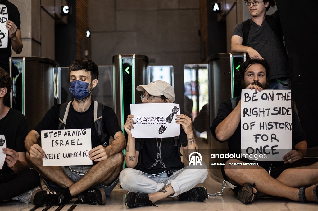 Israeli demonstrators demand Berlin administration cut arms exports to Israel in Tel Aviv