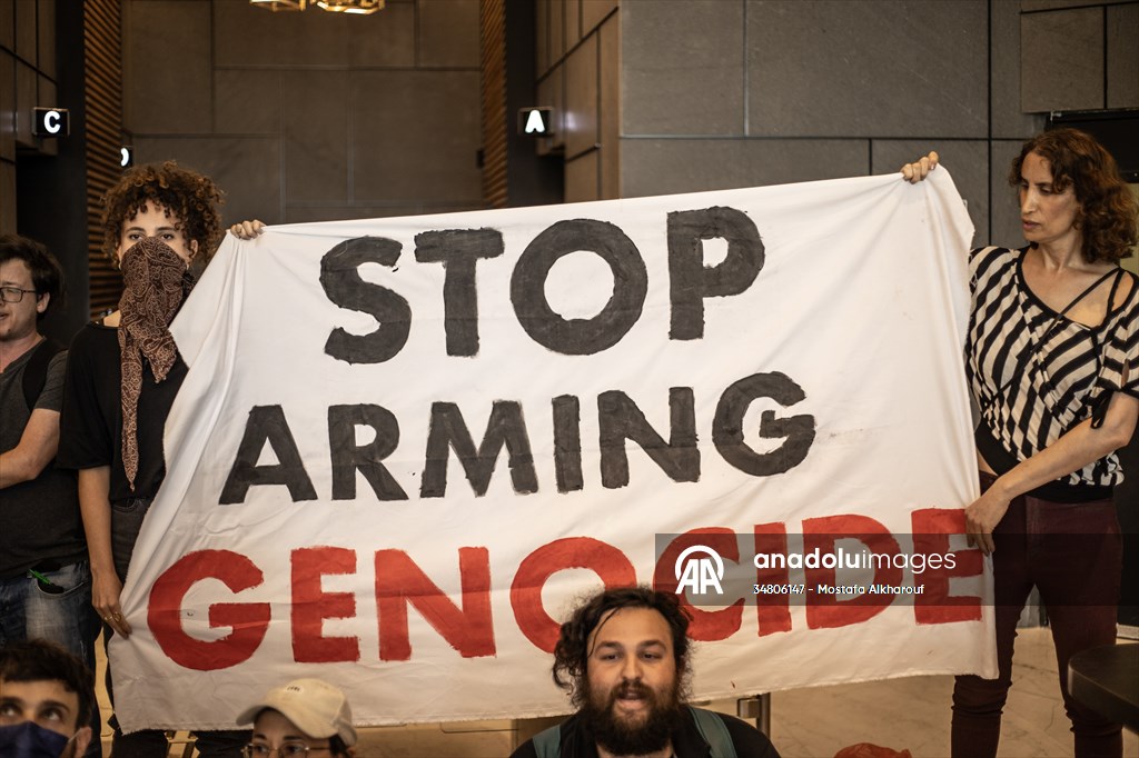 Israeli demonstrators demand Berlin administration cut arms exports to Israel in Tel Aviv