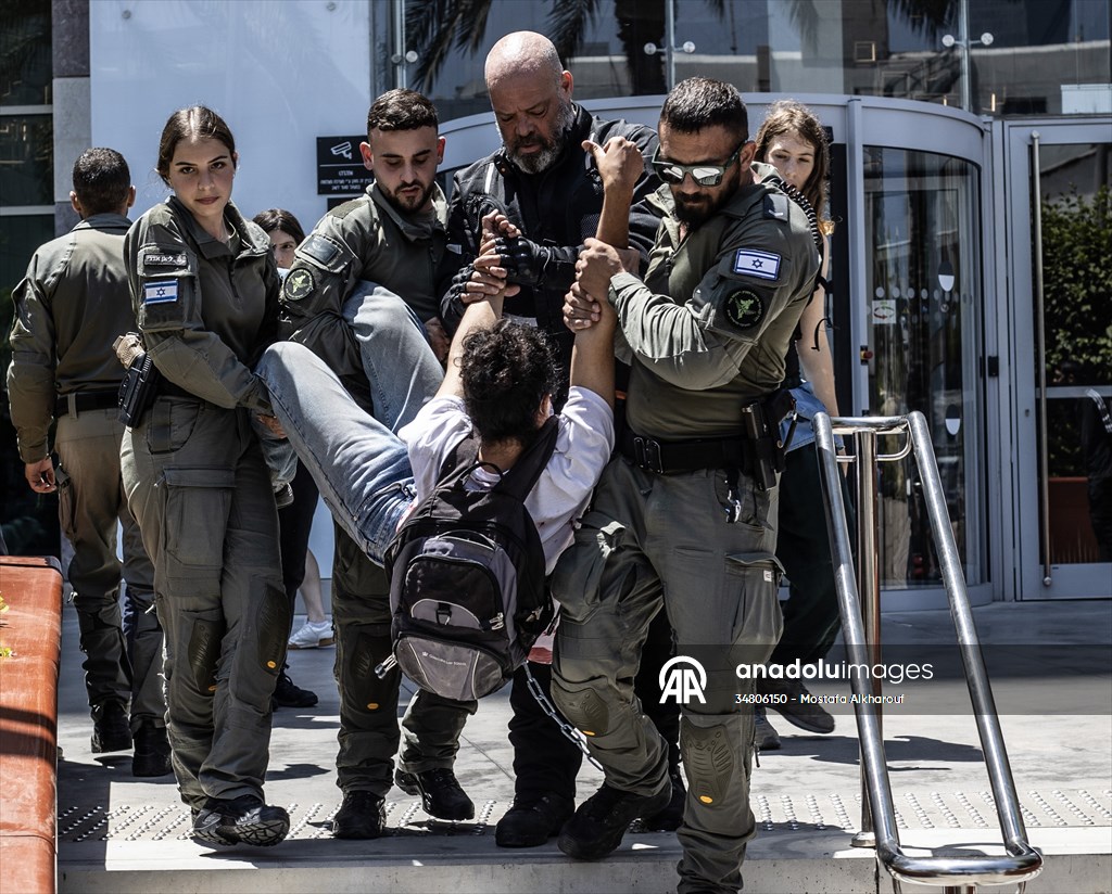 Israeli demonstrators demand Berlin administration cut arms exports to Israel in Tel Aviv