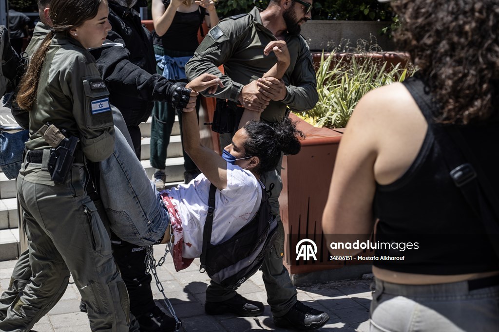 Israeli demonstrators demand Berlin administration cut arms exports to Israel in Tel Aviv