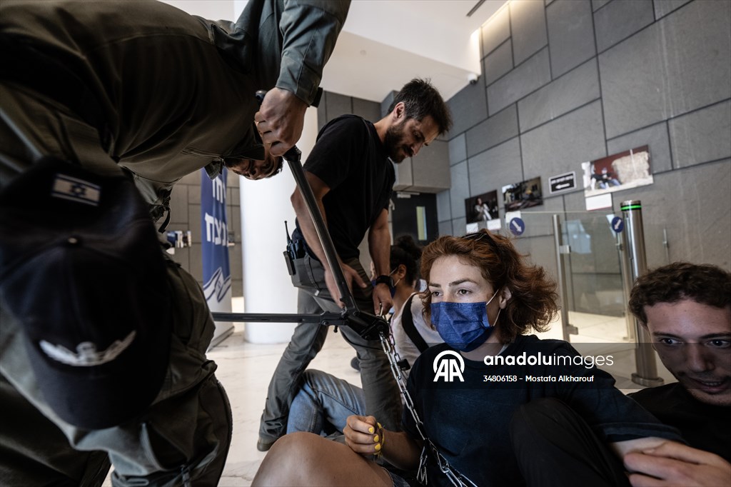 Israeli demonstrators demand Berlin administration cut arms exports to Israel in Tel Aviv