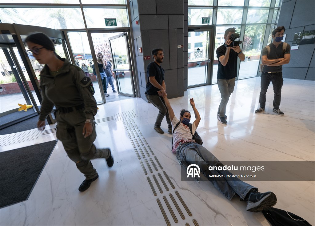 Israeli demonstrators demand Berlin administration cut arms exports to Israel in Tel Aviv