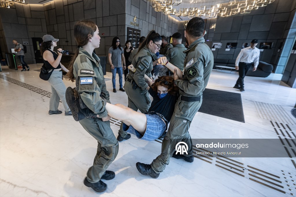 Israeli demonstrators demand Berlin administration cut arms exports to Israel in Tel Aviv