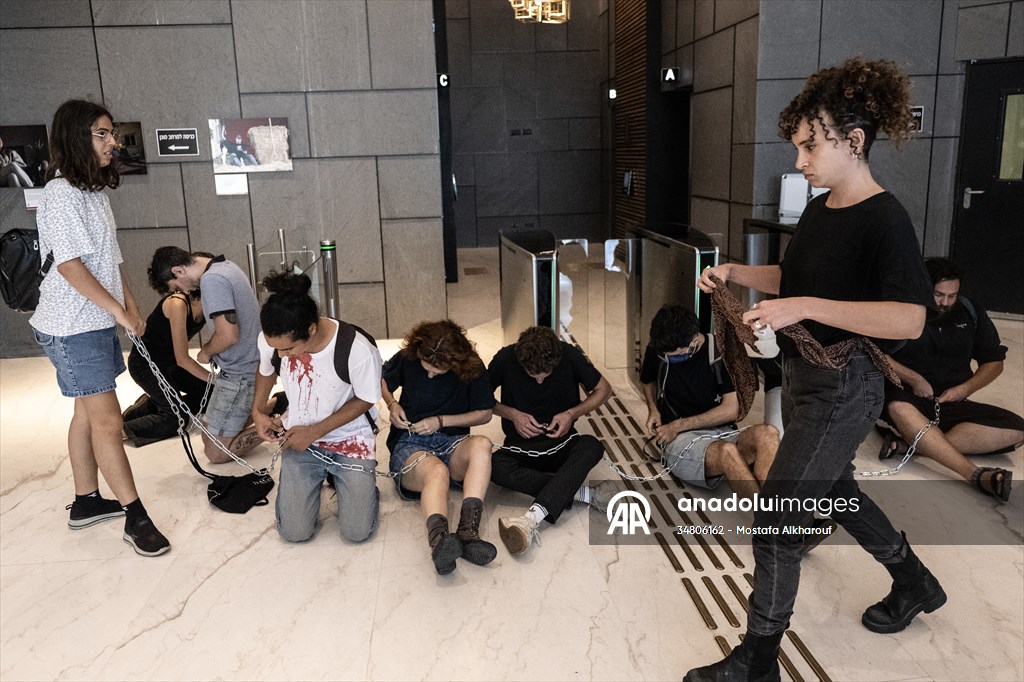 Israeli demonstrators demand Berlin administration cut arms exports to Israel in Tel Aviv