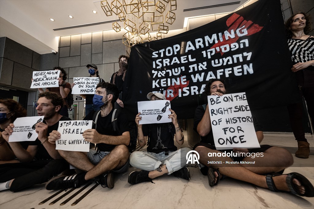 Israeli demonstrators demand Berlin administration cut arms exports to Israel in Tel Aviv