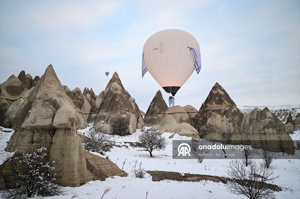 Hot air balloons with 'Palestinian keffiyeh' pattern rise above Cappadocia