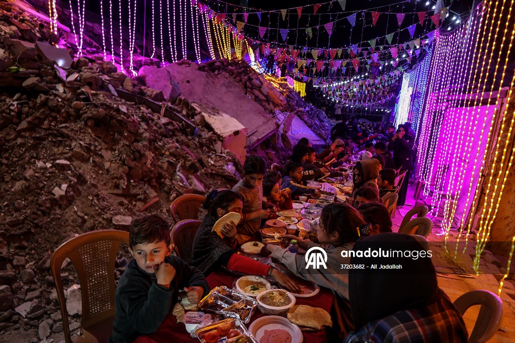 First sahur meal among the collapsed houses in Khan Yunis