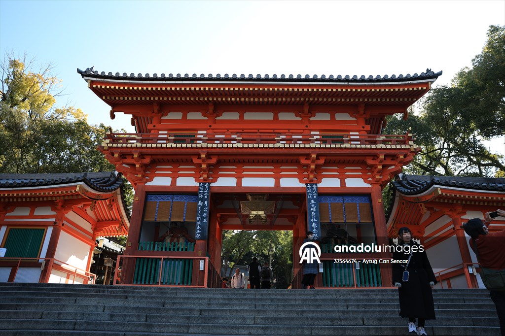 Fushimi Inari Shrine in Kyoto welcomes tourists and locals, reflecting daily life