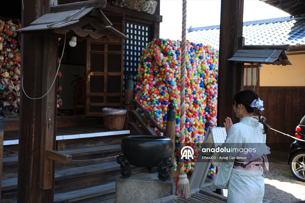 Fushimi Inari Shrine in Kyoto welcomes tourists and locals, reflecting daily life