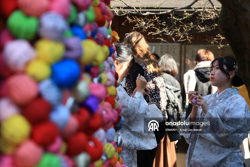 Fushimi Inari Shrine in Kyoto welcomes tourists and locals, reflecting daily life