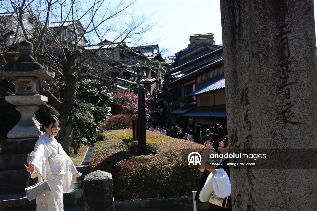 Fushimi Inari Shrine in Kyoto welcomes tourists and locals, reflecting daily life