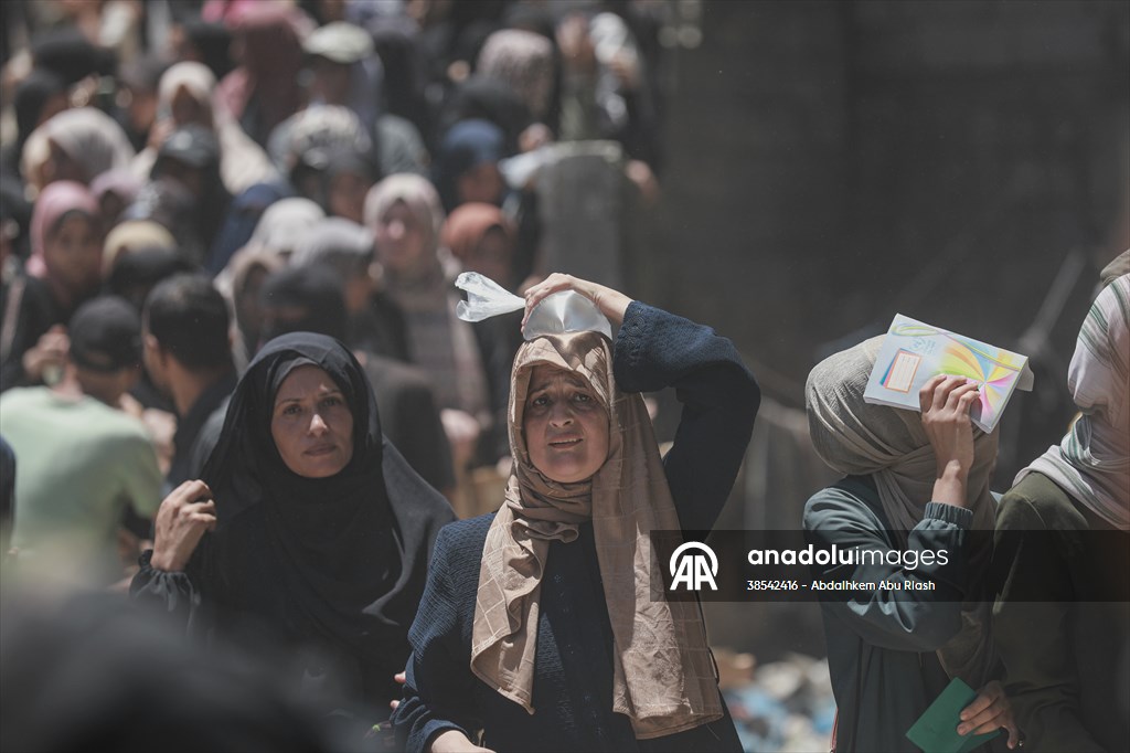 Flour aid distributed to Palestinians in Gaza under Israeli attacks